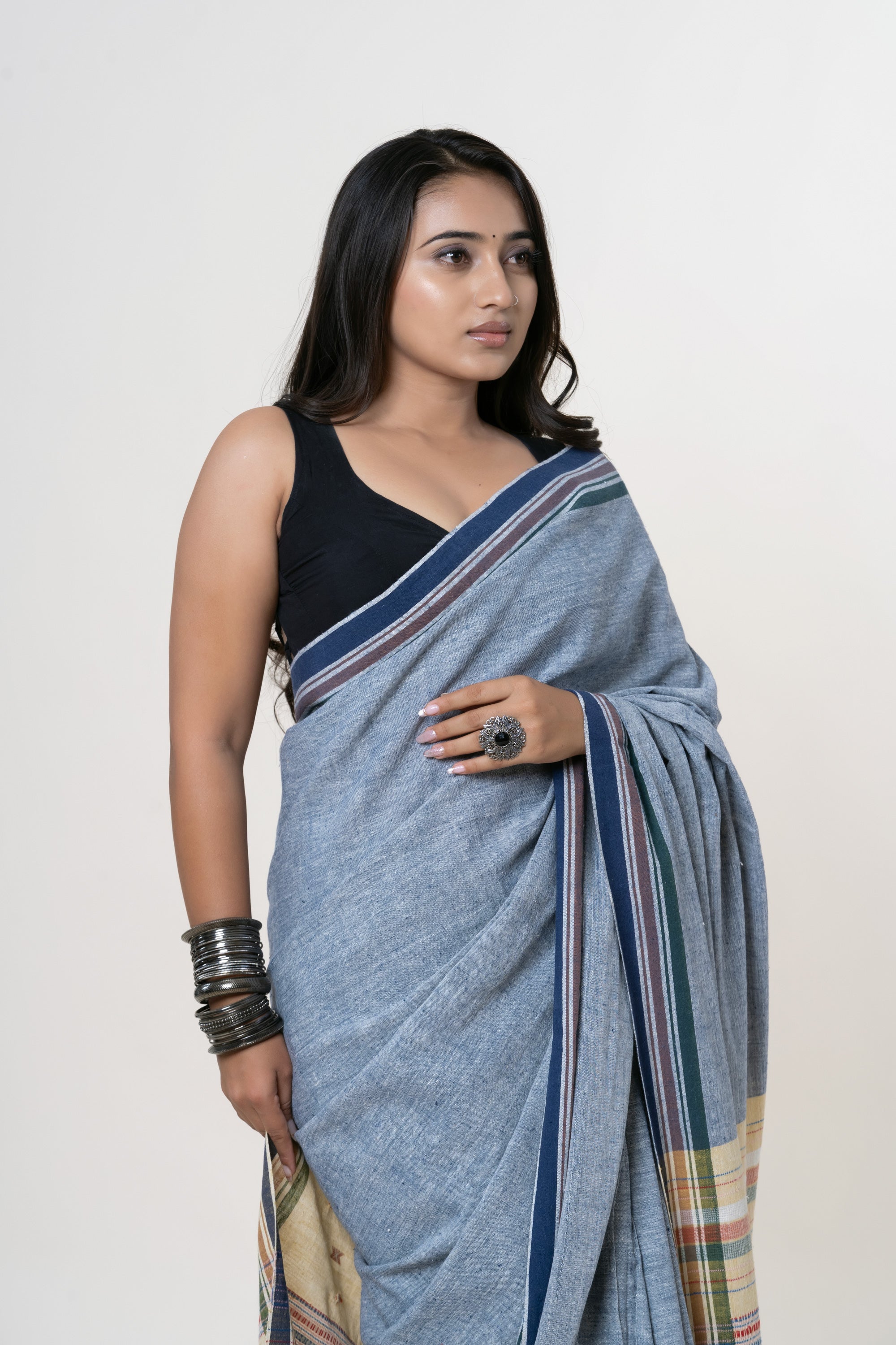 Slate Blue heathered Bhujodi Handwoven Kala Cotton Saree with Cream and multi-colored Motifs