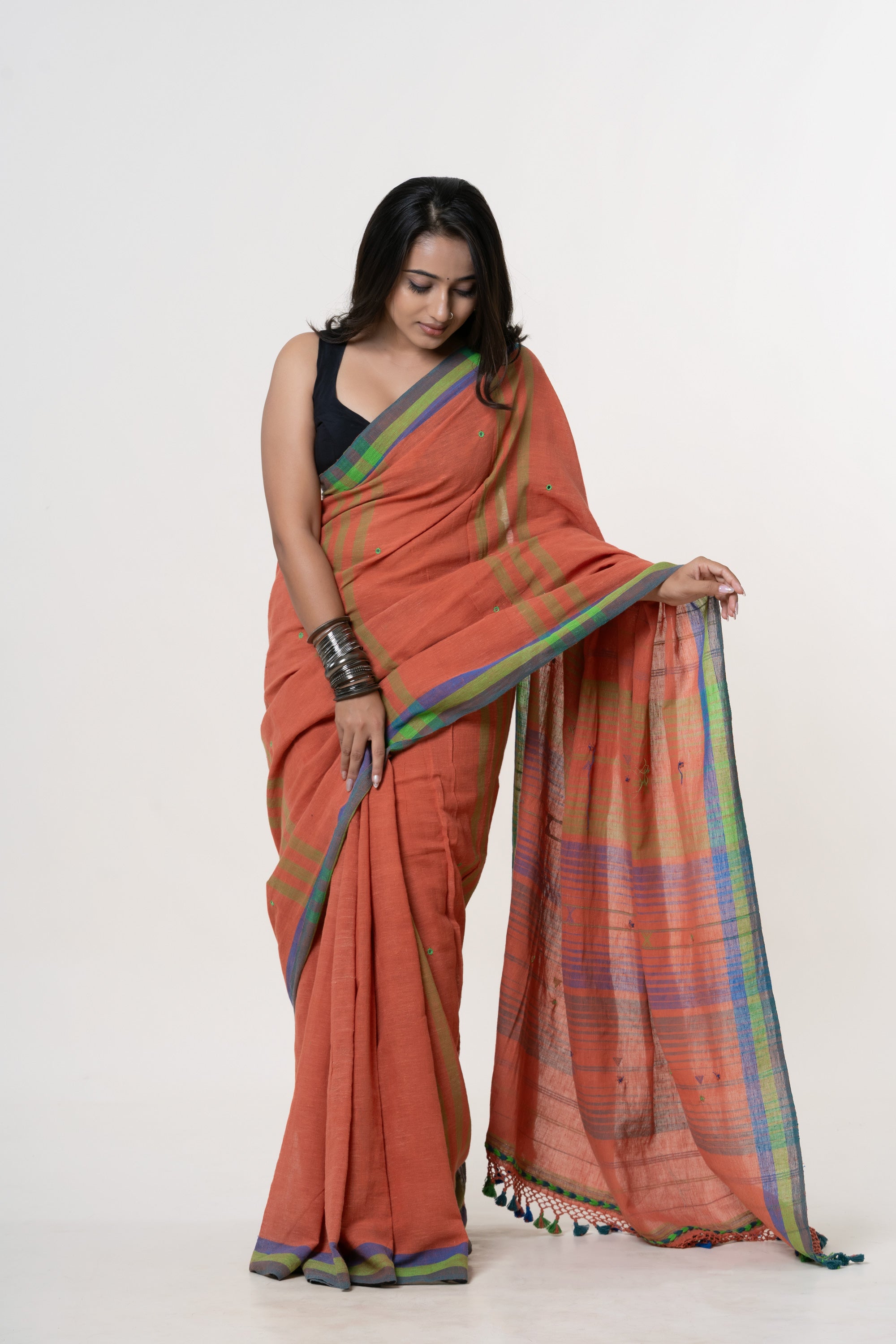Deep Terracotta Orange Bhujodi Handwoven Kala Cotton Saree with Cobalt Blue and Lime Green Motifs