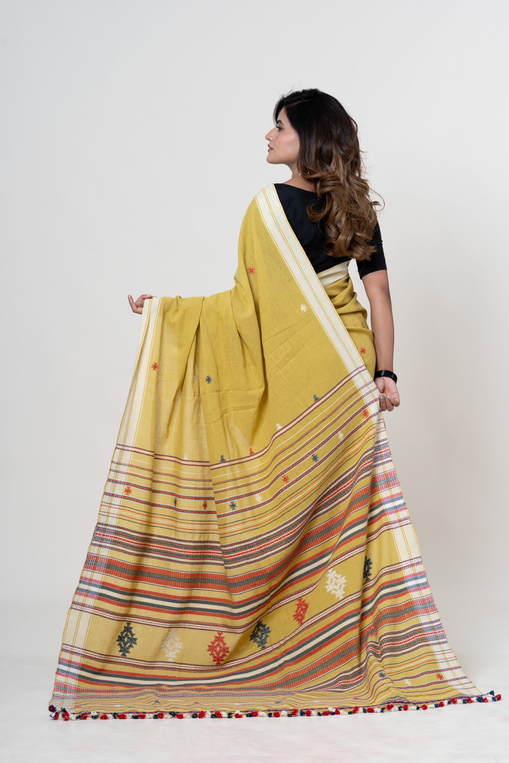 Mustard Yellow Bhujodi Handwoven Kala Cotton Saree with Multi-colored Motifs