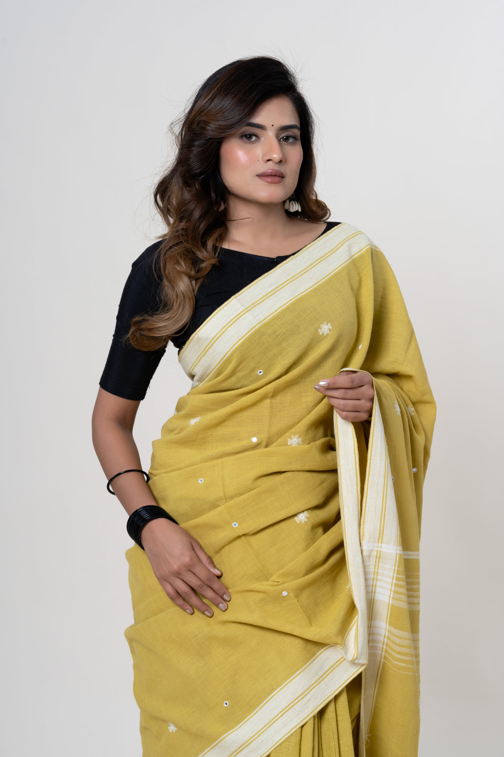 Mustard Yellow Bhujodi Handwoven Kala Cotton Saree with White Motifs and Mirror Work