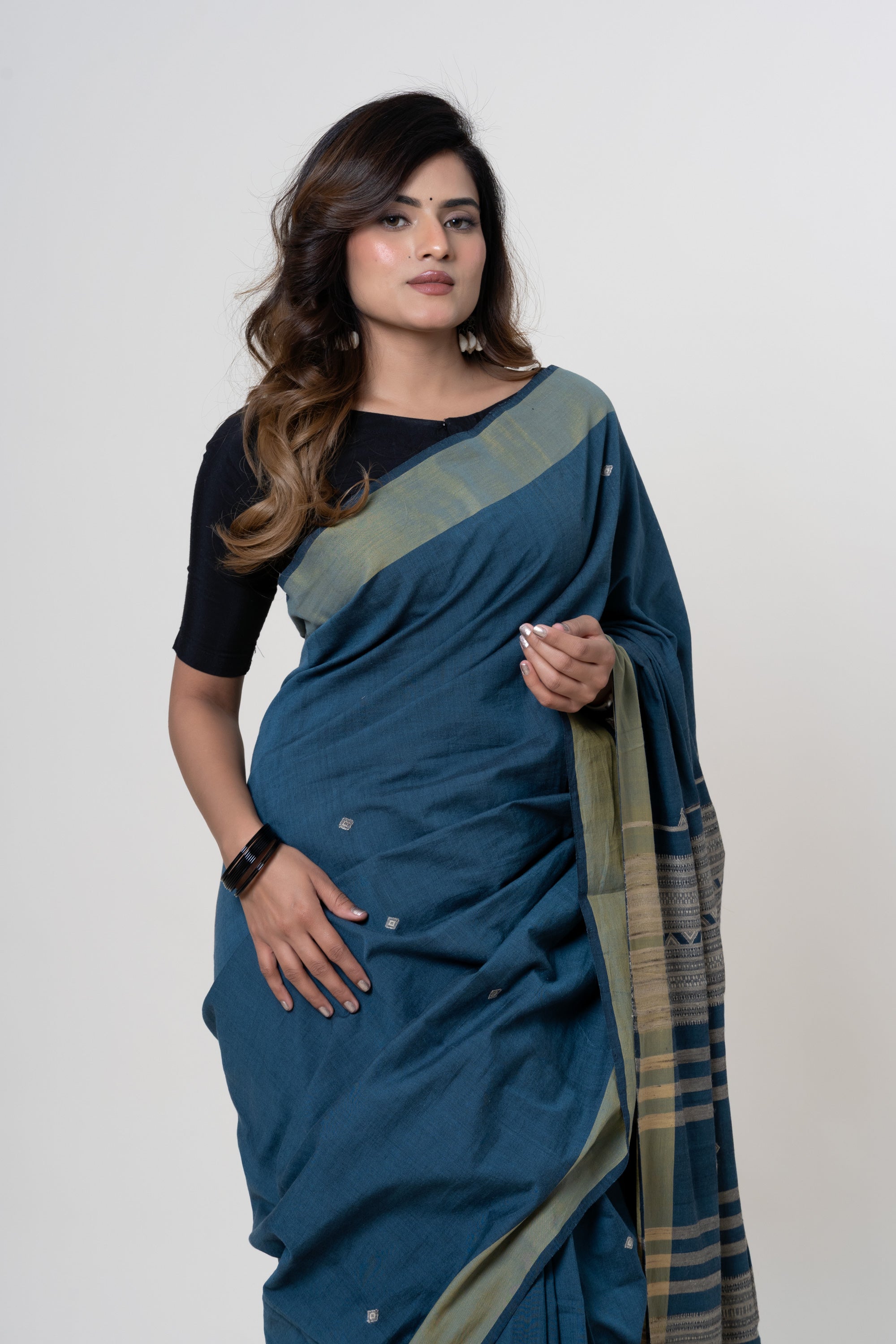 Deep Teal Blue Bhujodi Handwoven Tussar Silk Saree with Beige/Gold Motifs