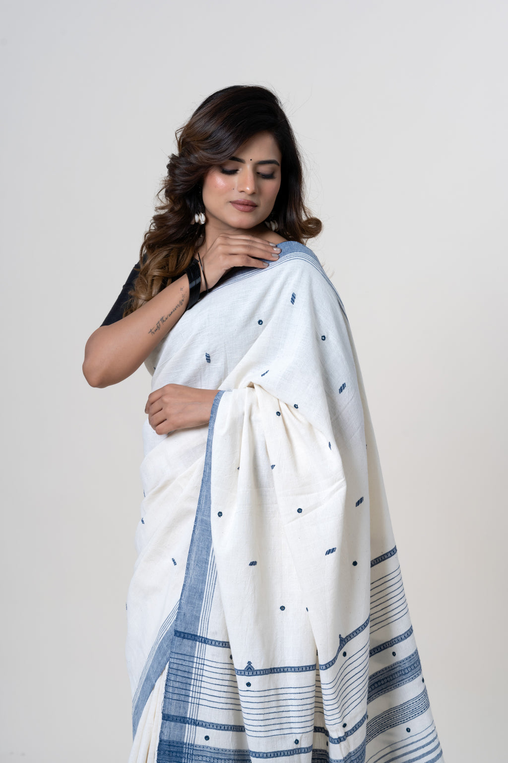 Natural Off-White Bhujodi Handwoven Kala Cotton Saree with Indigo Blue Motifs and Mirror work