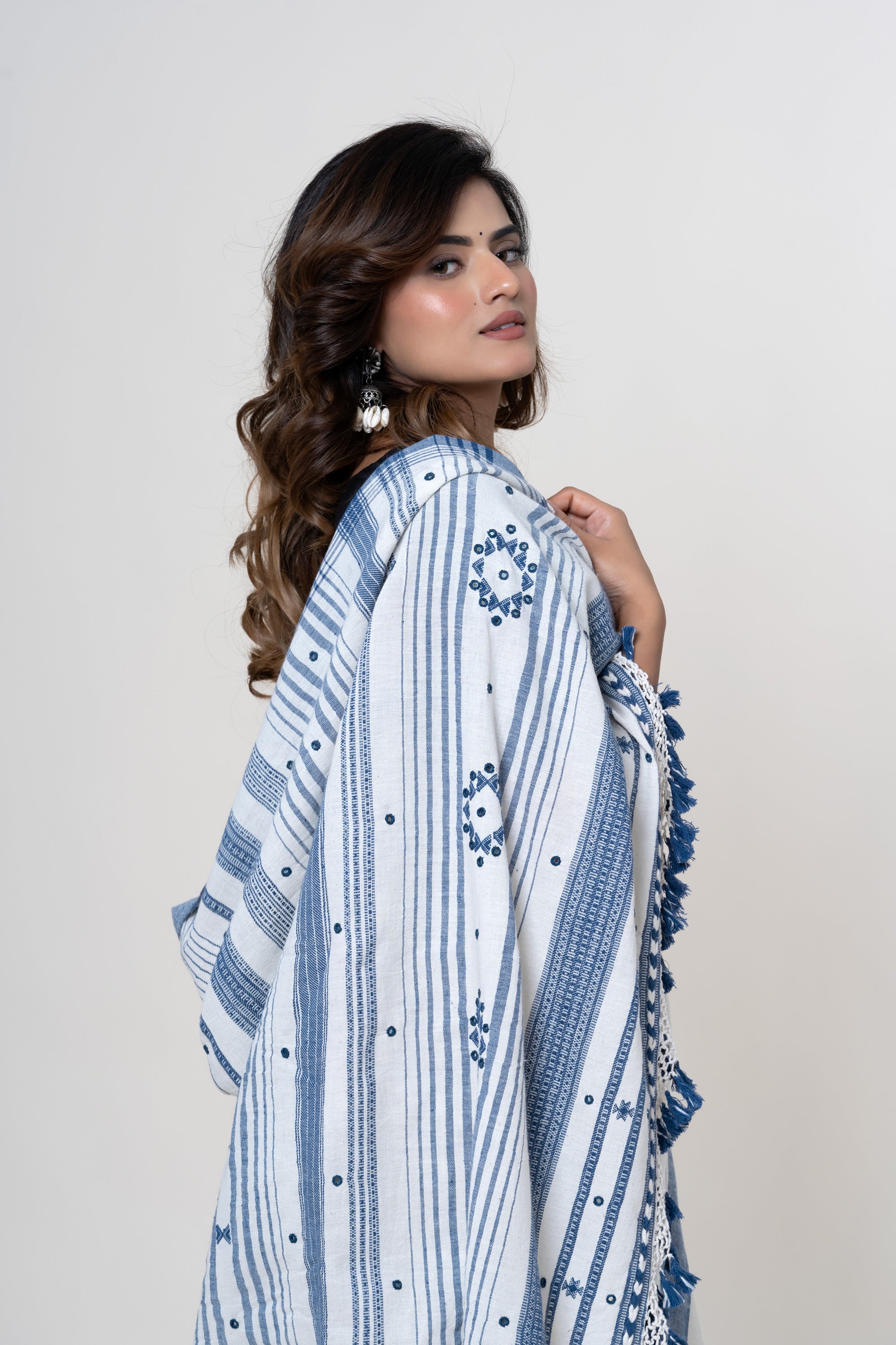 Natural Off-White Bhujodi Handwoven Kala Cotton Saree with Indigo Blue Motifs and Mirror work